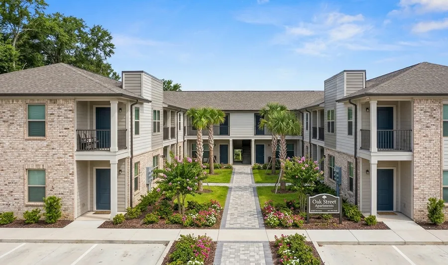 Multi-unit apartment complex with consistent custom cabinetry installations
